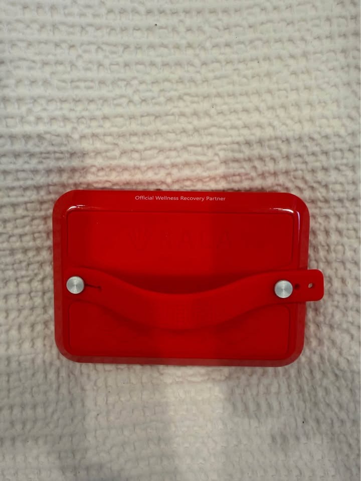 Red silicone rear hand strap on the Kala Mini 2.0